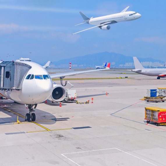 airport-boarding-bridge-for-a-passenger-plane-view-at-the-parking-lot-of-hong-kong-airport_t20_znJnBx